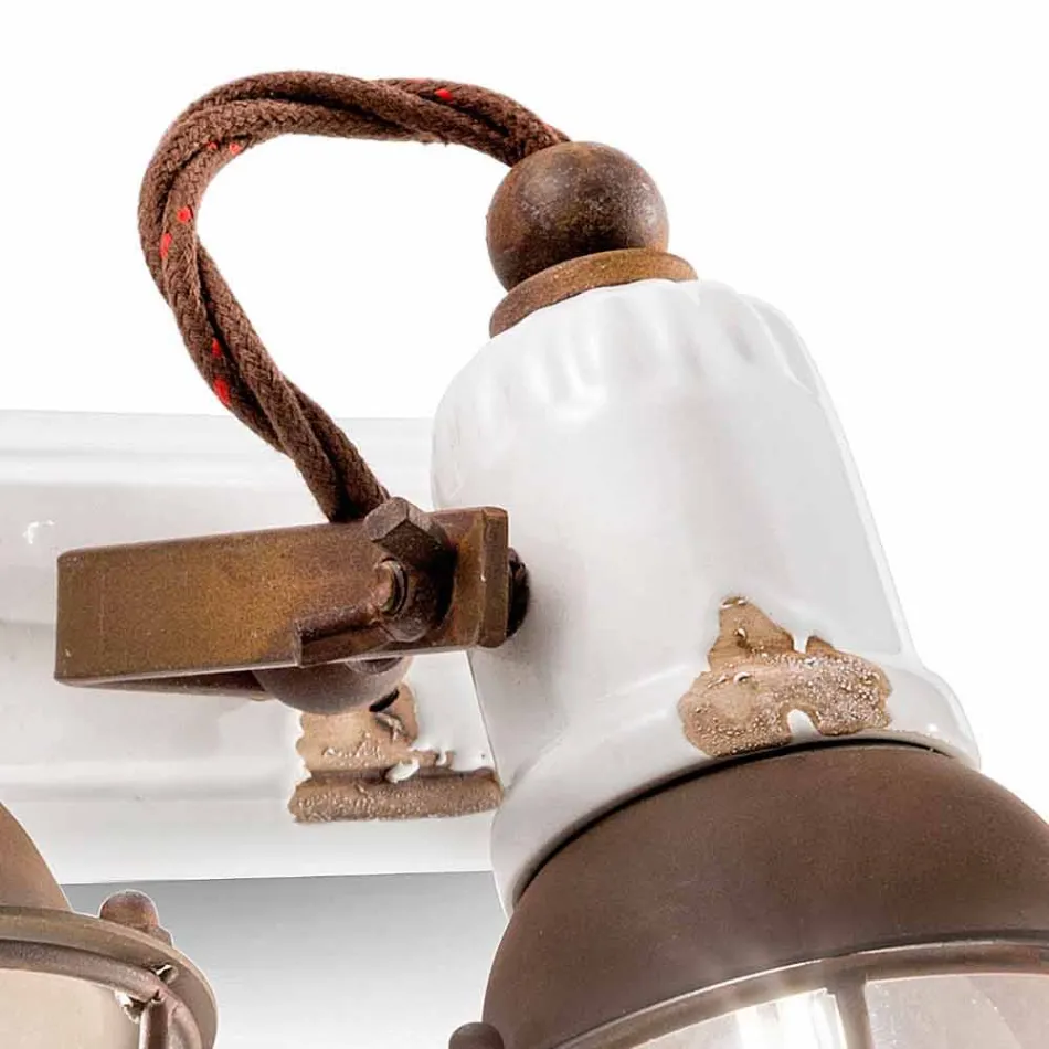 diseño de la aplicación y tres focos de cerámica y metal Lacey viadurini