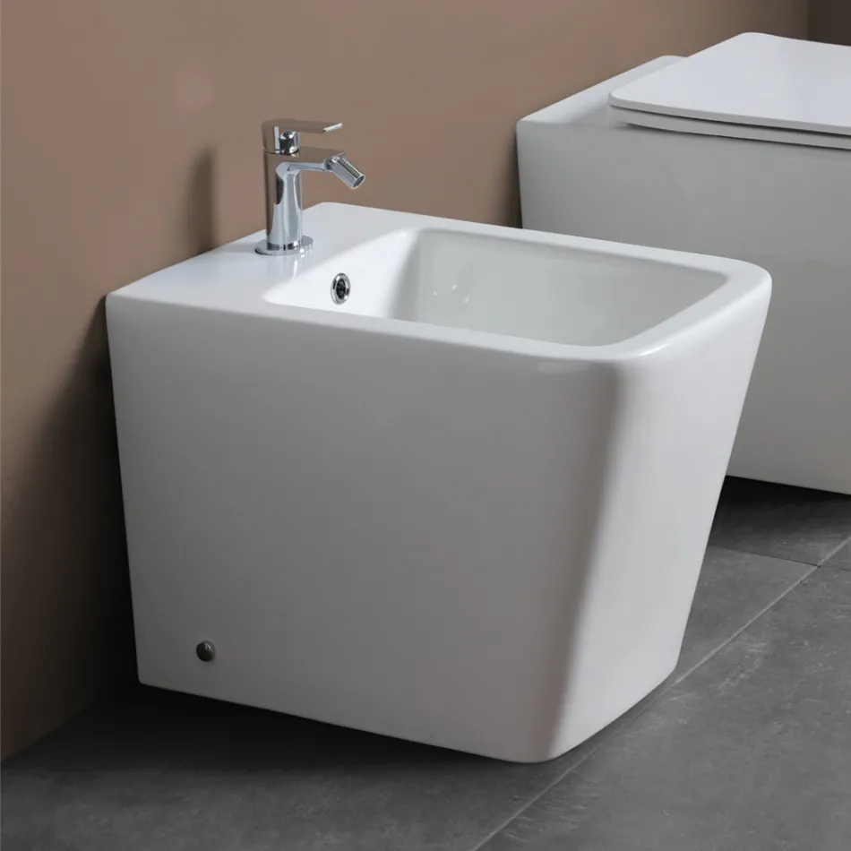 Bidé monomando de pie en cerámica blanca con un elegante diseño moderno - Giunco viadurini