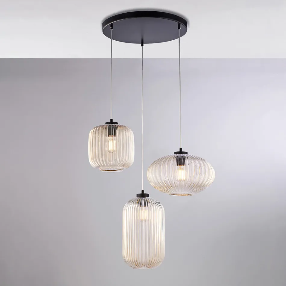 Un accesorio de diseño brillante en vidrio y metal, fabricado en Italia, con un aspecto elegante - Tucana viadurini