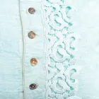 Funda de almohada en lino de colores, encaje Poema y ribetes de lujo italiano - Stego viadurini