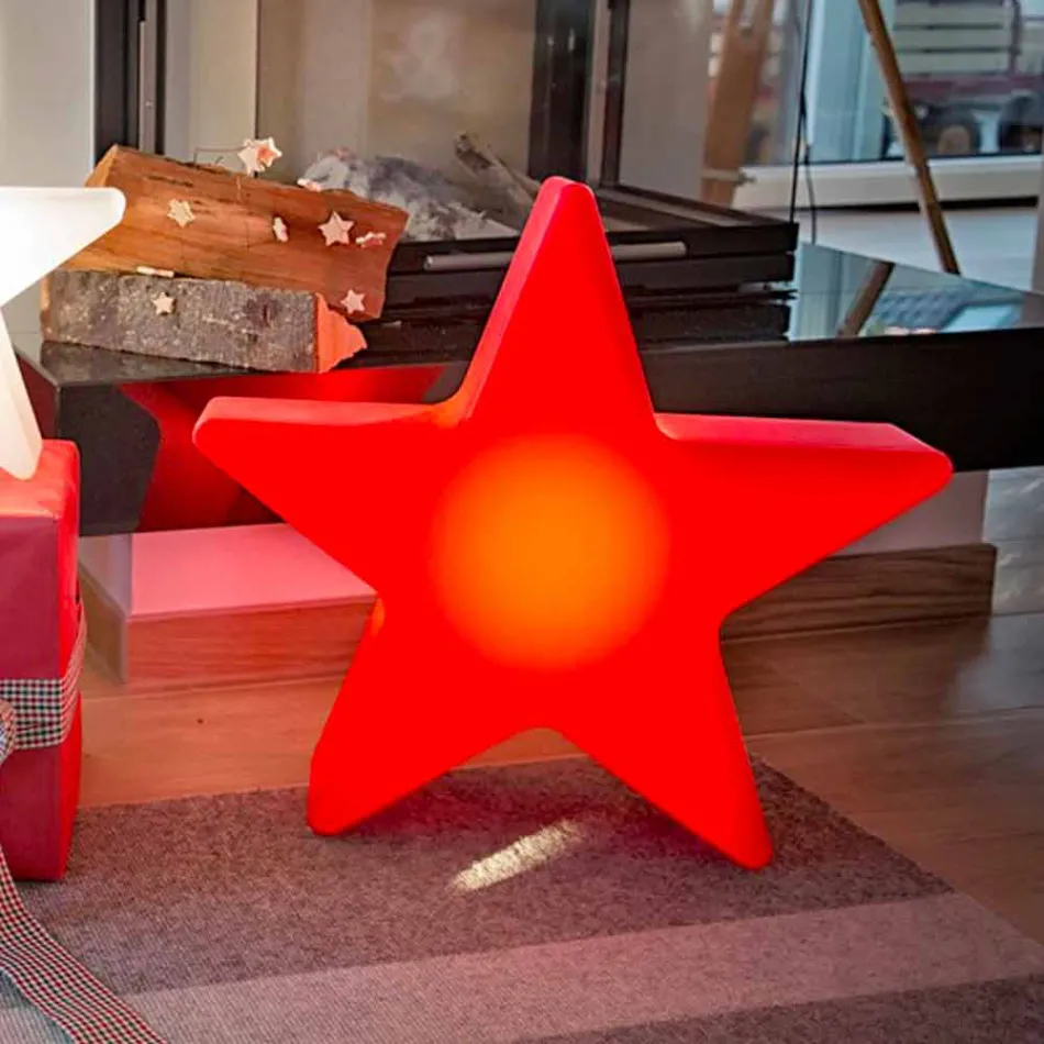 Lámpara de pie en forma de estrella blanca o roja, diseño moderno - Ringostar viadurini