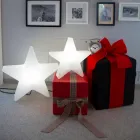 Lámpara de pie en forma de estrella blanca o roja, diseño moderno - Ringostar viadurini