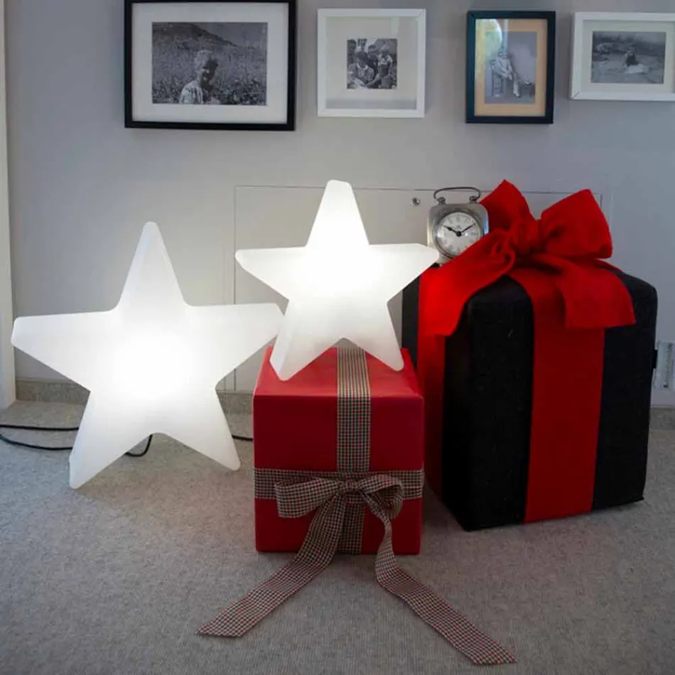 Lámpara de pie en forma de estrella blanca o roja, diseño moderno - Ringostar viadurini