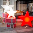 Lámpara de pie en forma de estrella blanca o roja, diseño moderno - Ringostar viadurini