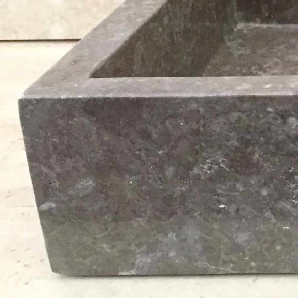 Lavabo de diseño de una pieza Jeff en piedra natural viadurini