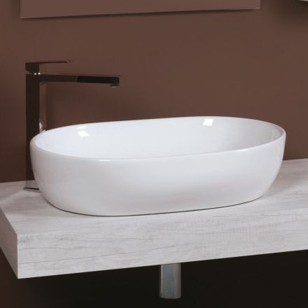 Lavabo ovalado de encimera en cerámica blanca con diseño moderno - Papavero viadurini