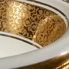 Fregadero redondo empotrado en arcilla fuego y oro hecho en Italia, Otis viadurini