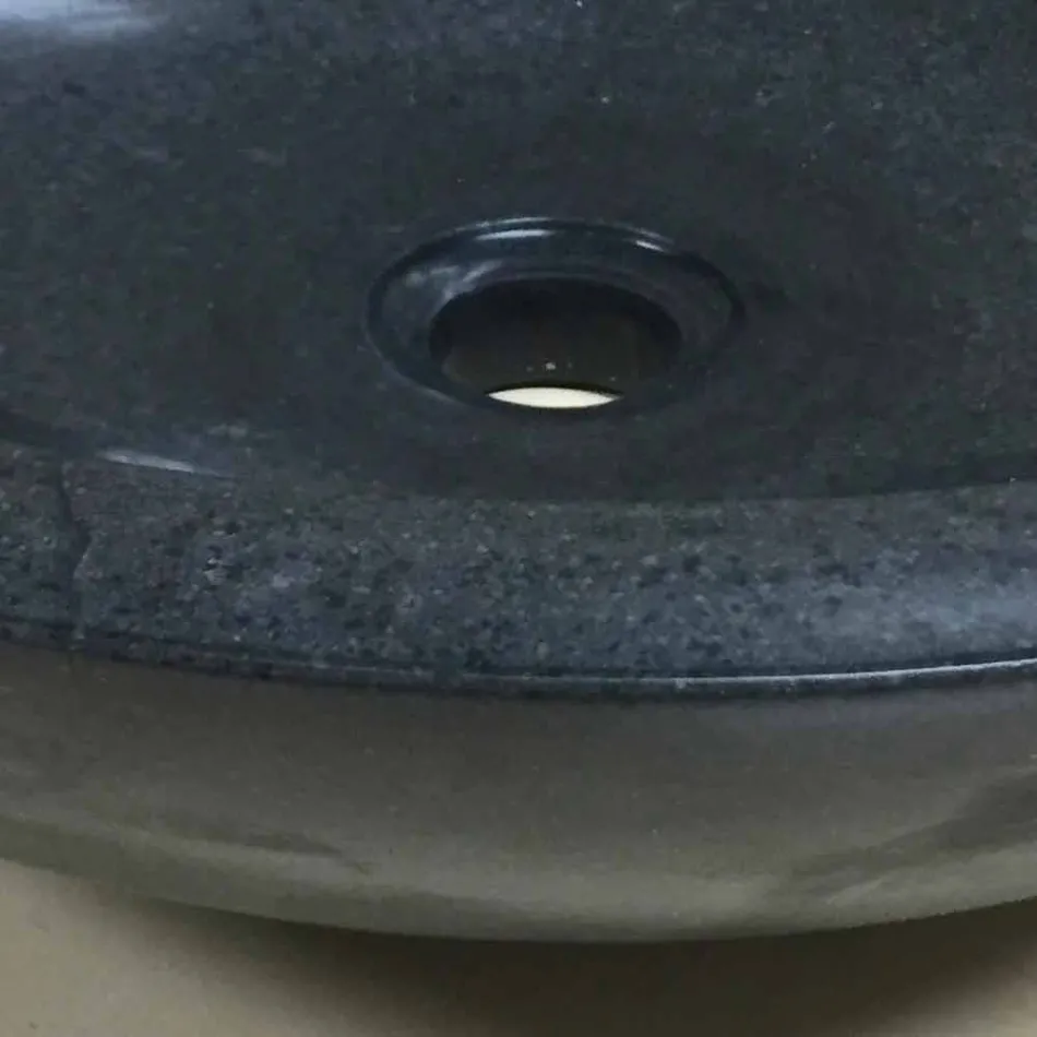 Lavabo sobre encimera de diseño en piedra natural Ziva negra viadurini