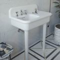 Lavabo de baño asimétrico de cerámica con soporte para objetos - Giusy