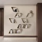 Estantería de pared metálica Eteris con espacio interior, disponible en tres colores. viadurini