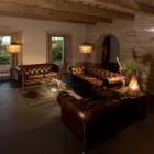 Sillón de Salón en Piel Vintage con Efecto Envejecido con Ruedas y Reposabrazos - Stamp viadurini