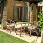 Sillón de exterior apilable en jardín de ratán natural - Spora viadurini