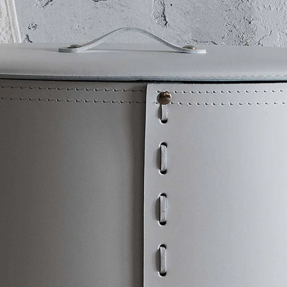 Lavadero ovalado en piel regenerada Riky hecho en Italia. viadurini