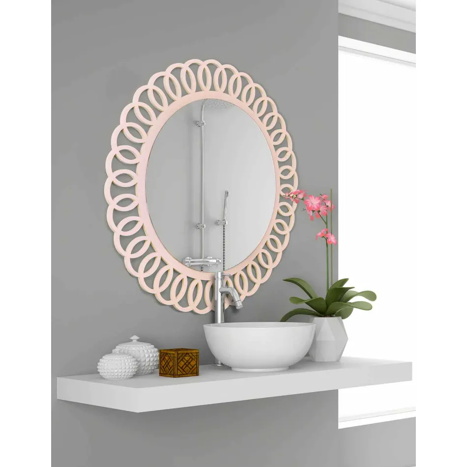 Espejo de pared grande de diseño moderno y decorativo en madera rosa - Corona viadurini