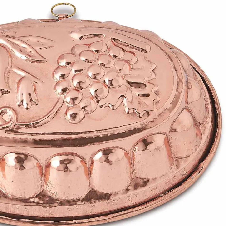 Postres Molde para pasteles ovalado en cobre estañado a mano con decoración - Gianfilippo viadurini