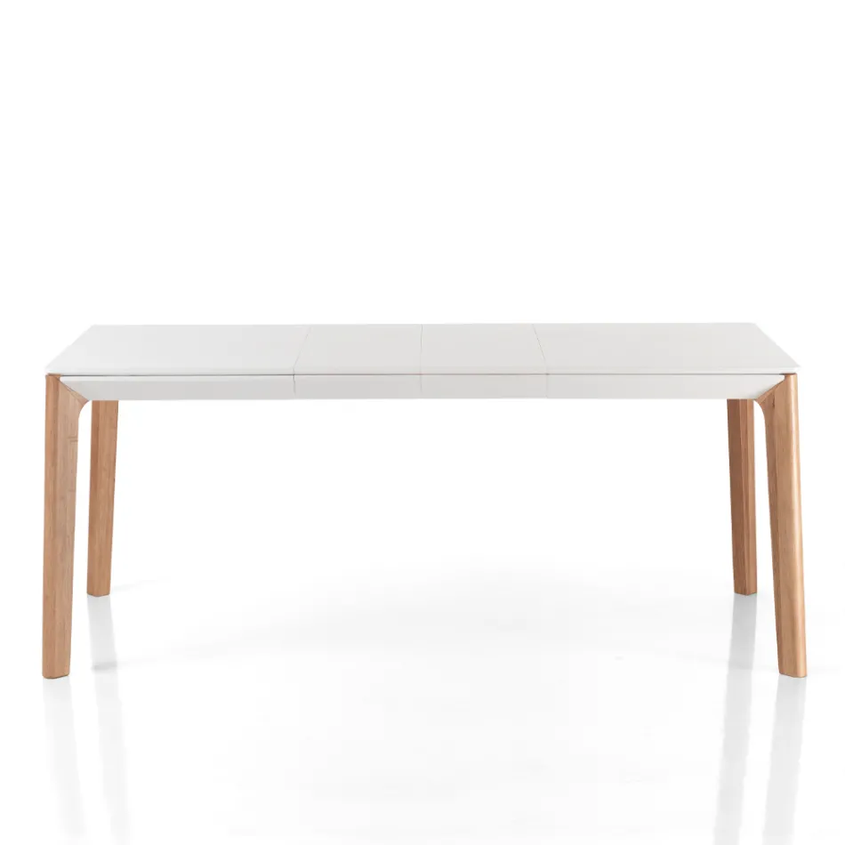 Mesa extensible hasta 180 cm con patas de madera maciza color roble y rutenio viadurini