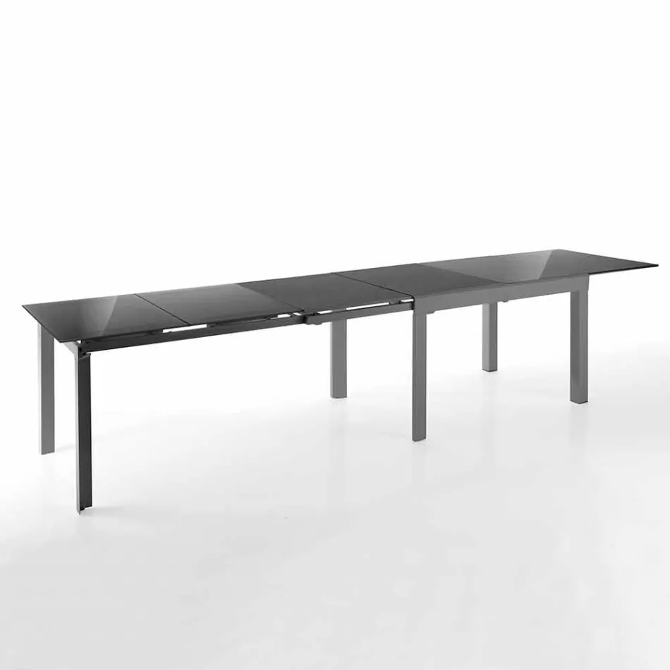 Mesa de diseño extensible en vidrio y metal, guerrero viadurini