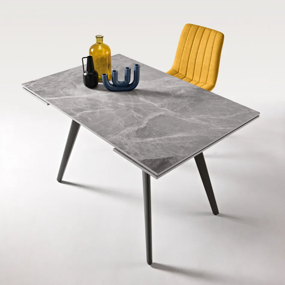 Mesa extensible de hasta 180 cm en piedra efecto mármol y metal - Numa viadurini