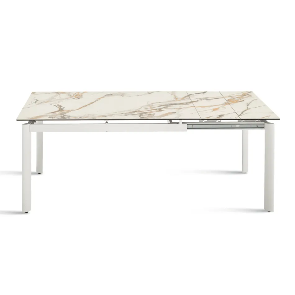 Mesa extensible de gres porcelánico con base de metal pintado - Arko viadurini