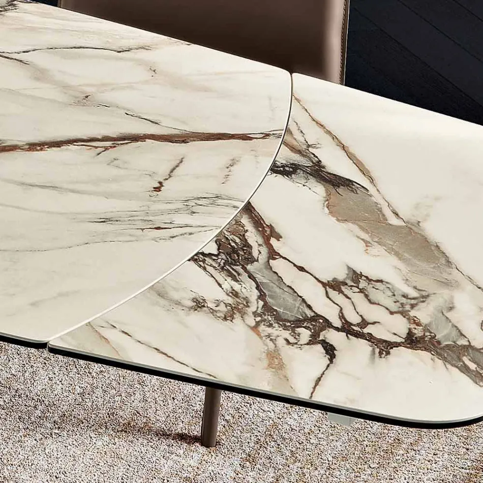 Mesa metálica extensible con tablero de gres porcelánico efecto mármol - Vittorio viadurini