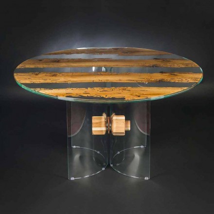 mesa de diseño redondo de cristal veneciano y el delfín de madera viadurini