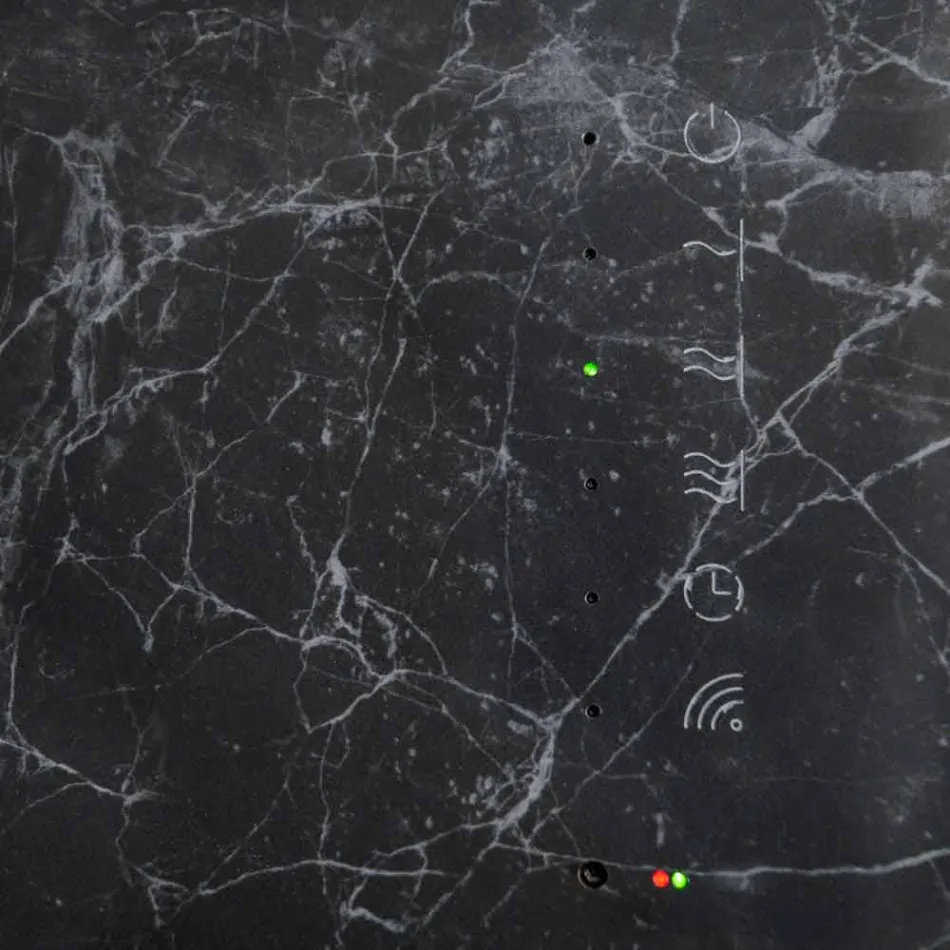 Radiador eléctrico de vidrio templado con acabado de piedra Jonny viadurini