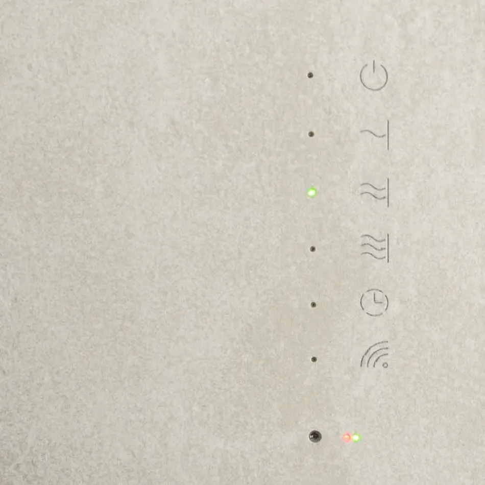 Radiador eléctrico de vidrio templado con acabado de piedra Jonny viadurini