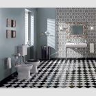 WC montado en el piso con casete de cerámica y asiento negro Made in Italy - Marwa viadurini