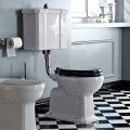 WC montado en el piso con casete de cerámica y asiento negro Made in Italy - Marwa