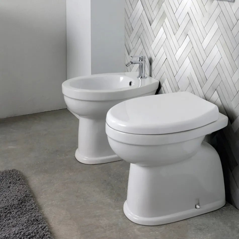 Inodoro cerámico de pie con asiento de poliéster y diseño moderno - Sílice viadurini