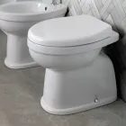 Inodoro cerámico de pie con asiento de poliéster y diseño moderno - Sílice viadurini