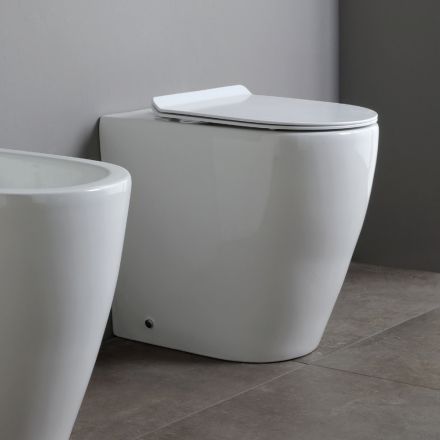 Inodoro de cerámica Oleander con descarga deslizante y asiento de cierre suave. viadurini