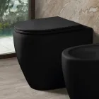 Inodoro Aster de cerámica mate bicolor sin borde con asiento de cierre suave.   viadurini