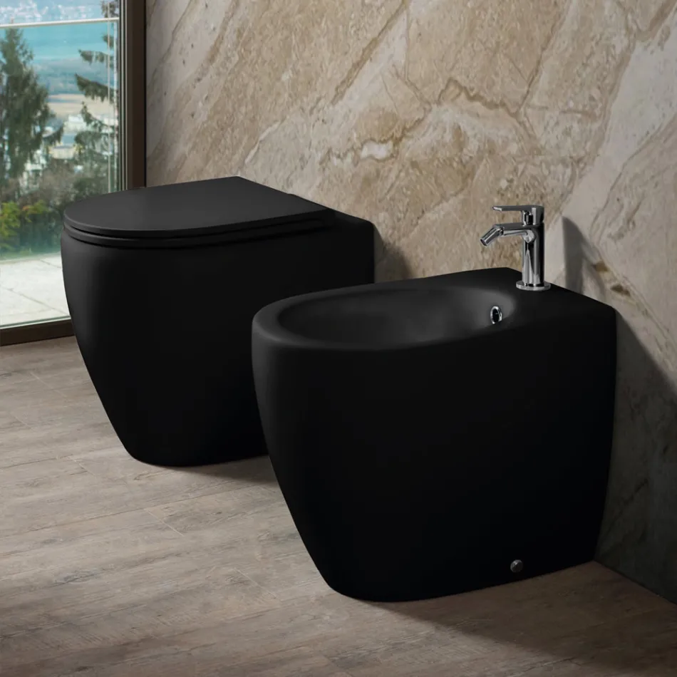 Inodoro Aster de cerámica mate bicolor sin borde con asiento de cierre suave.   viadurini